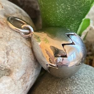 Penhaligon egg shaped  pendant originally sold as a child’s tooth holder